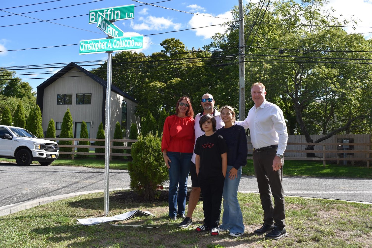Pictured left to right are Christopher’s family (left to right): his mother Jennifer; father Christopher; brother Dominick and sister Isabella; and councilman Foley.